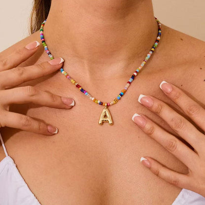 Kralen initiaal ketting
