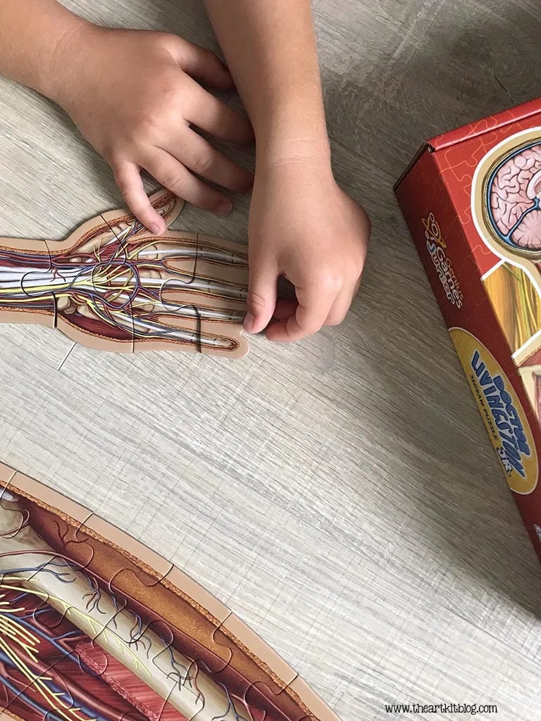 Vloerpuzzel voor kinderen met 100 stukjes van het menselijk lichaam